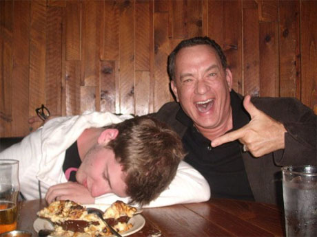 Photos of actor Tom Hanks posing with a fan pretending to be drunk have inspired a flood of celebrity-encounter stories on Reddit. (imgur.com) 